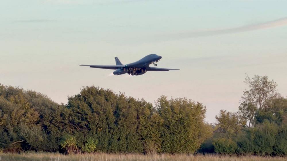 Trump pulls US bombers from UK base after alleged threat