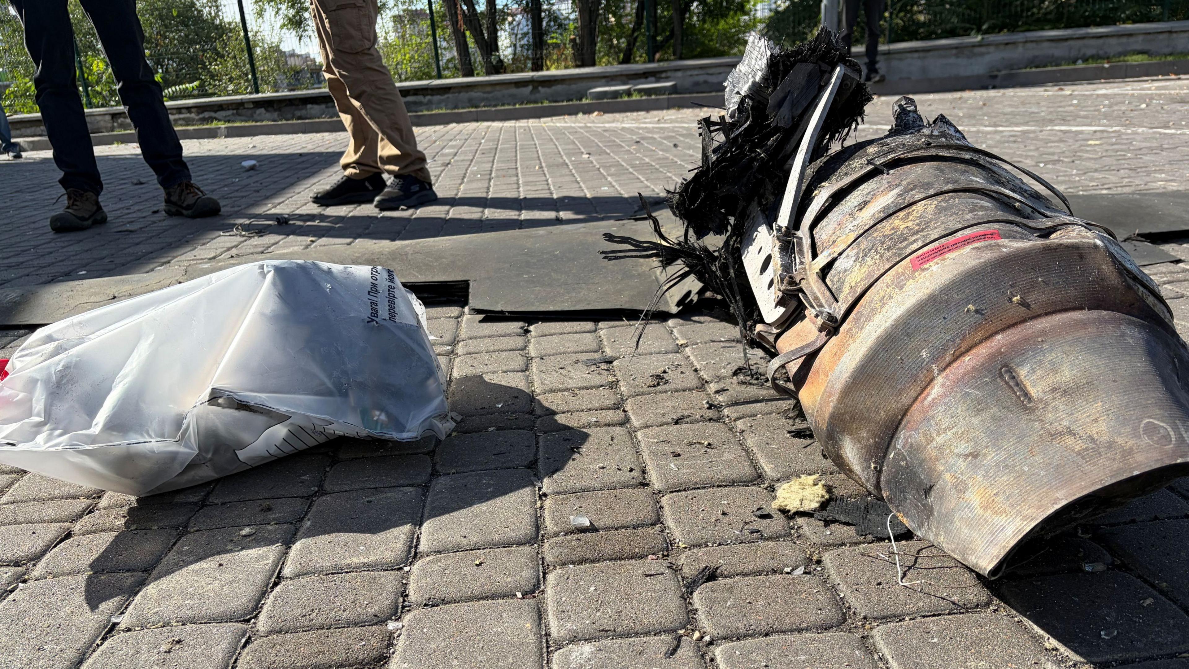 Drone wreckage on a Kyiv pavement