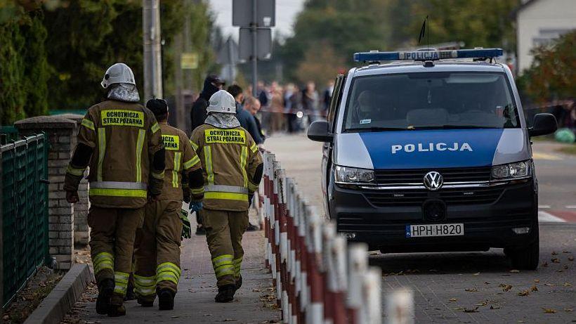 Police and first responders at a school scene in Poland