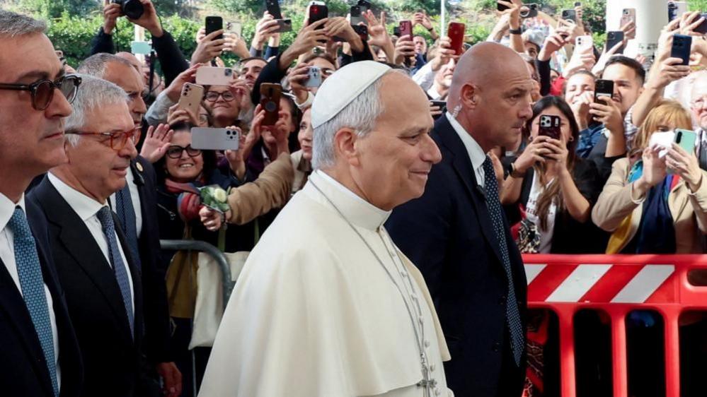 Pope Leo arriving at the hospital