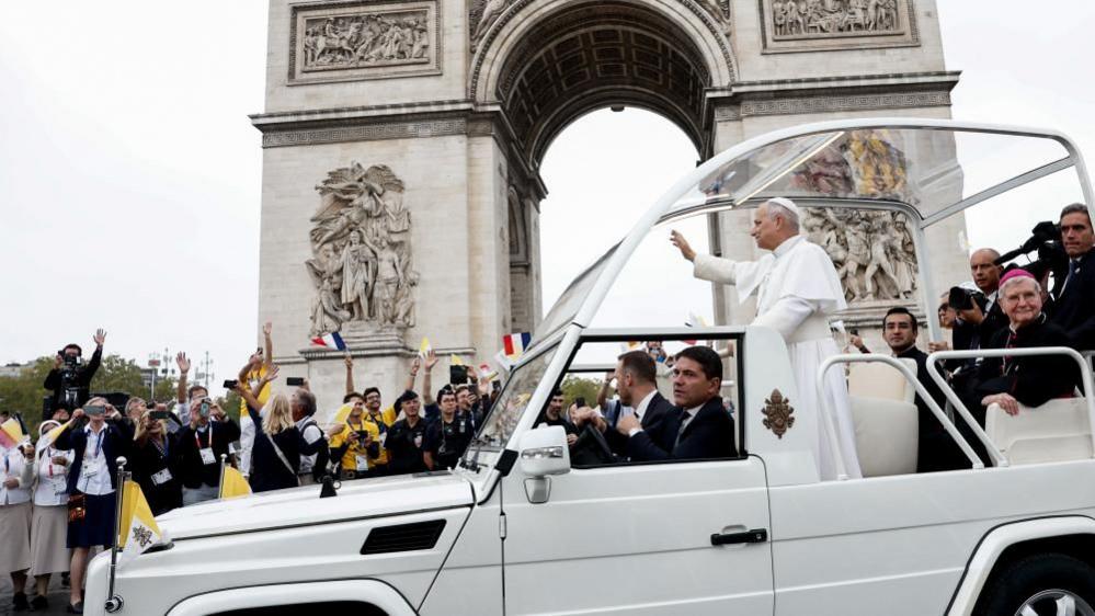 Pope Leo on his popemobile in Paris