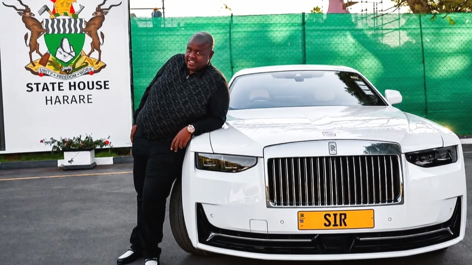 Wicknell Chivayo leaning against a white Rolls‑Royce with a yellow number plate and a state‑house backdrop