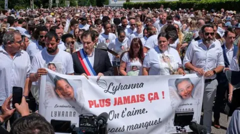 French town buries murder victim amid public outrage over police failings