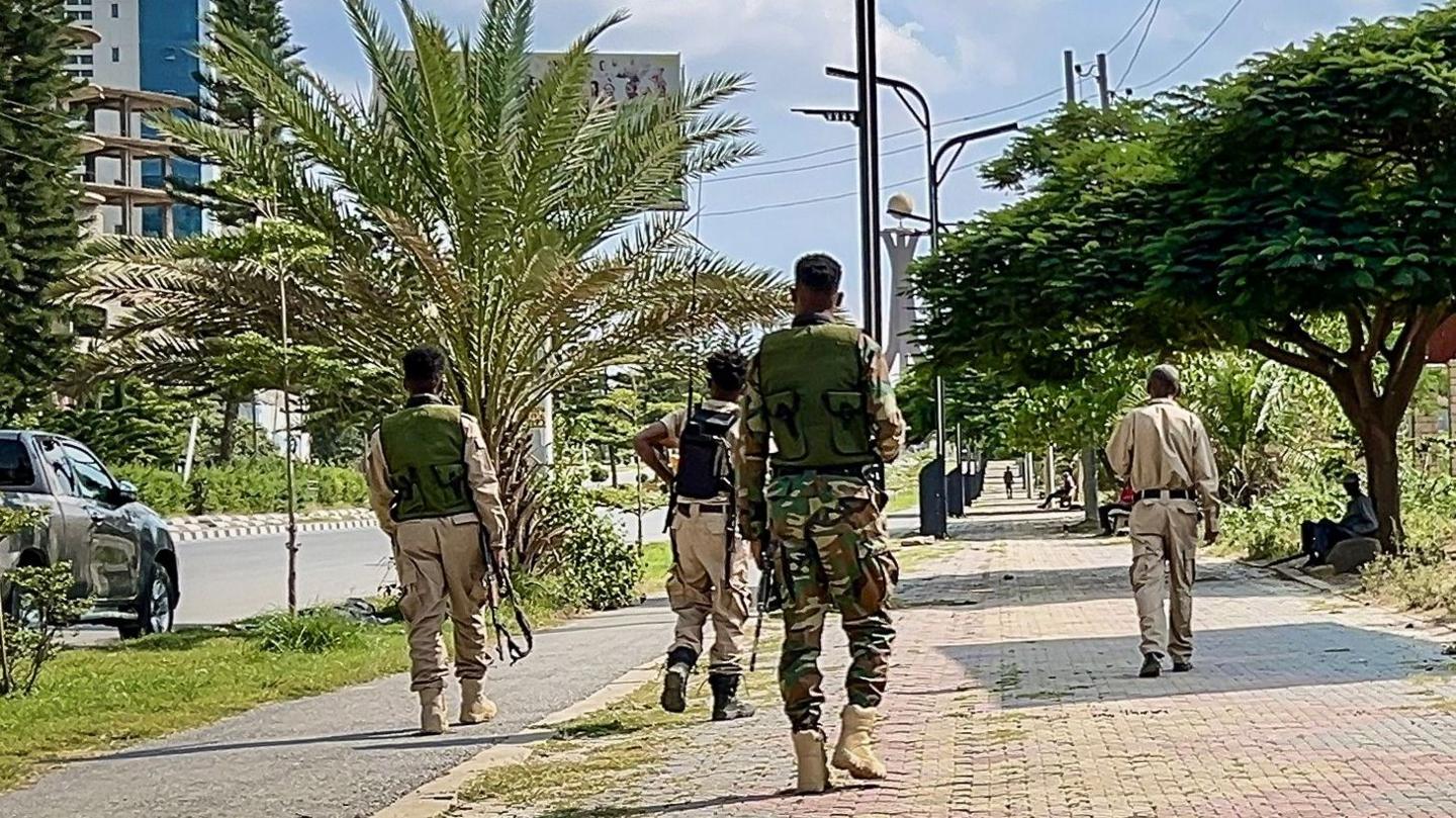 Mekelle soldiers walking with rifles