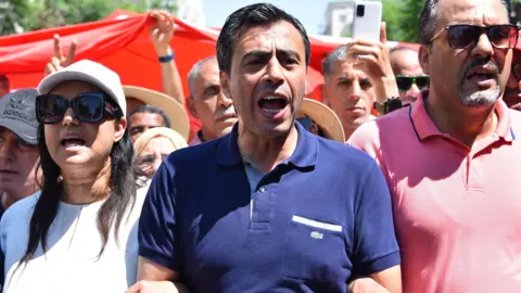 Dozens Sentenced in Tunisia's Political Crackdown