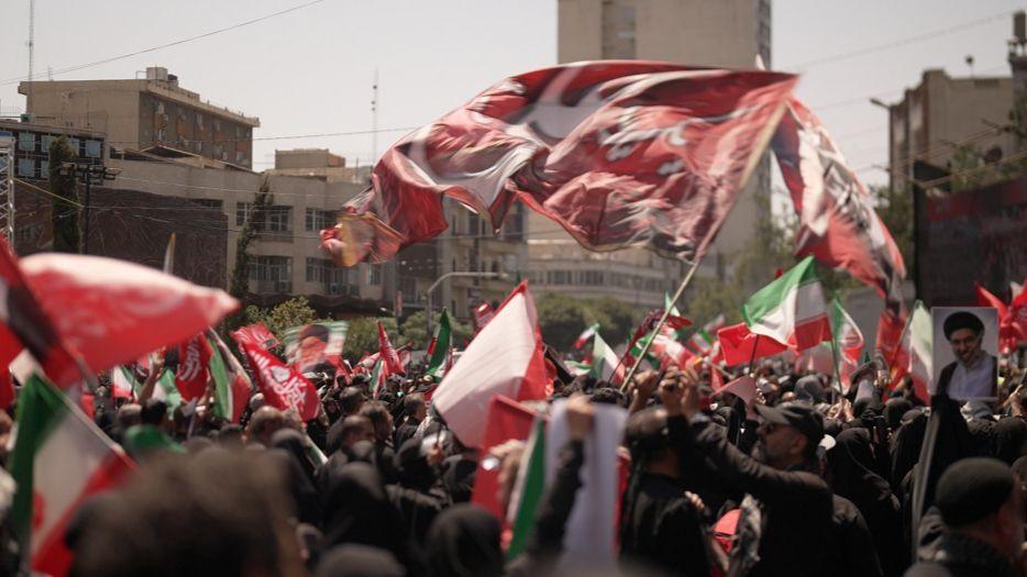 Iran’s mourners in a grand funeral procession