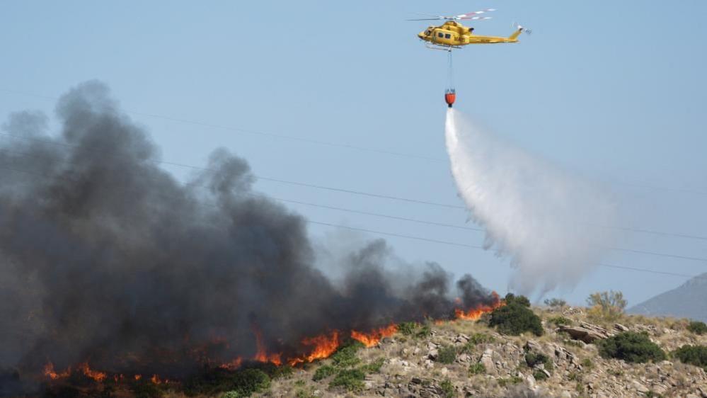 Helicopter fighting wildfire