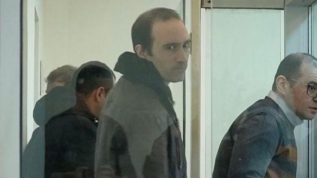 Martin Ryan standing with short hair and a jacket