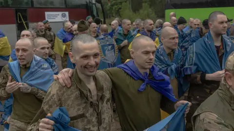 Ukrainian Prisoner Swap Amid Mourning for Kyiv Missile Strike Victims