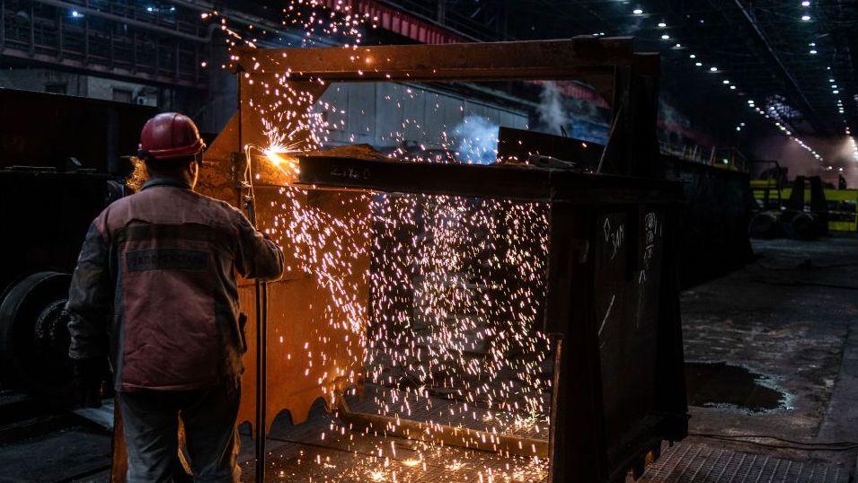 Worker at the Zaporizhstal steel plant, owned and operated by Metinvest, in Ukraine.
