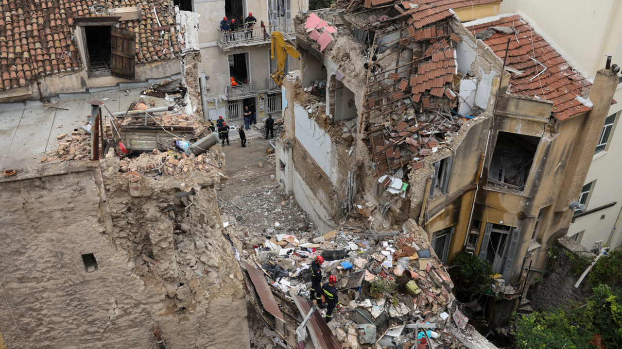 Debris and emergency crews at the collapsed building