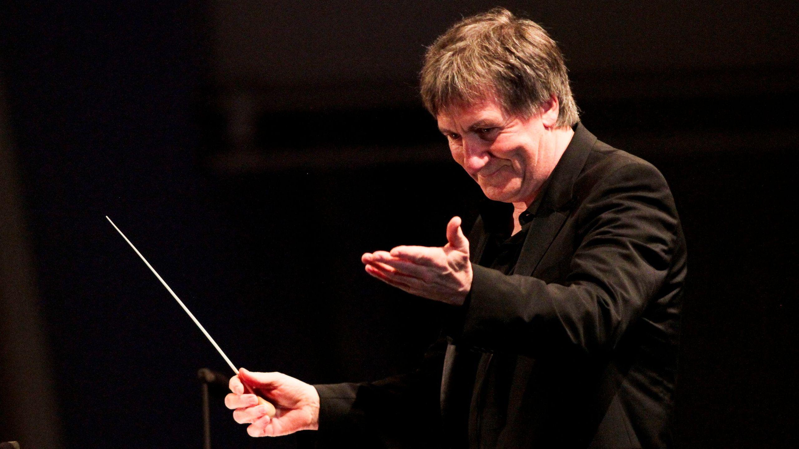George Fenton conducting an orchestra